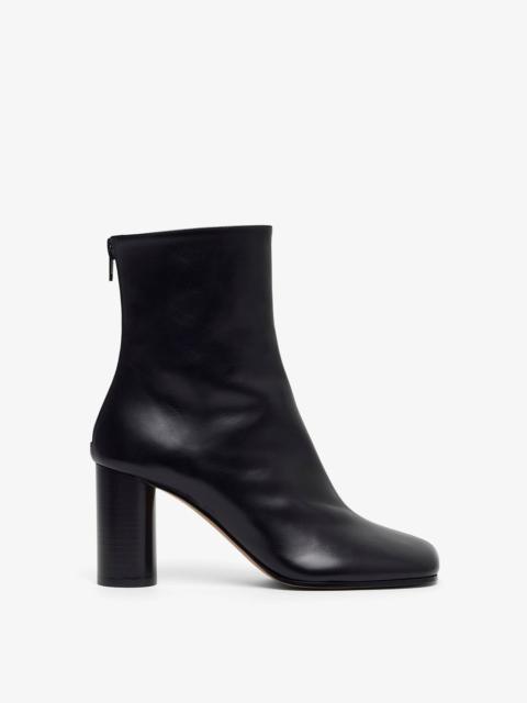 Tug 80 black ankle boots