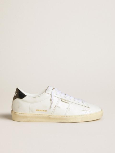 Matchstar in white leather with dark blue leather heel tab