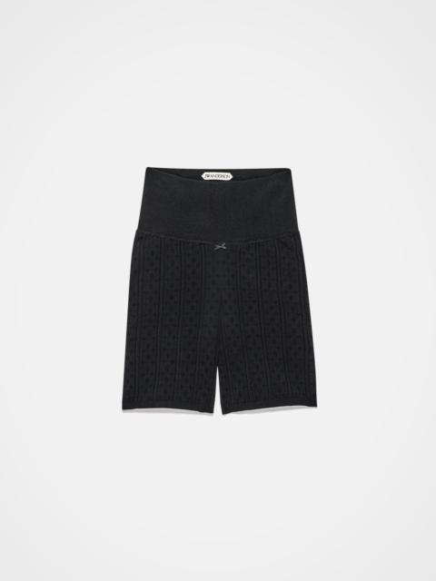 KNITTED POINTELLE FITTED SHORTS IN BLACK