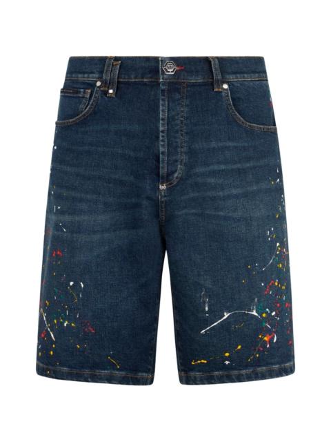 paint-splatter-effect denim shorts
