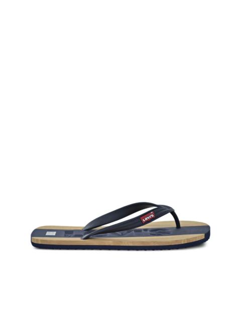 Jayden logo-embossed flip flops