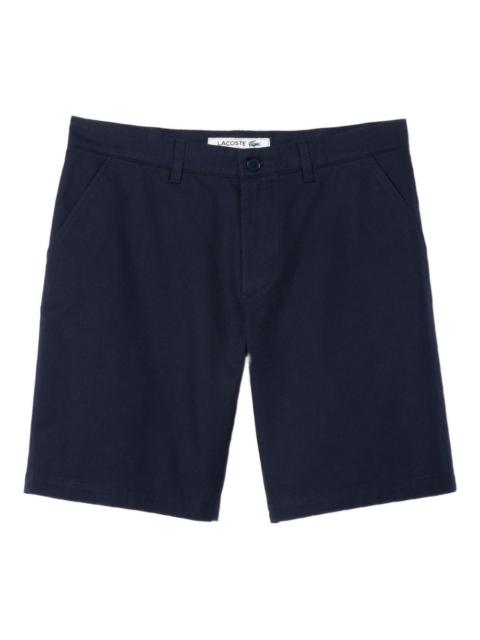 Commuter button-fastening shorts