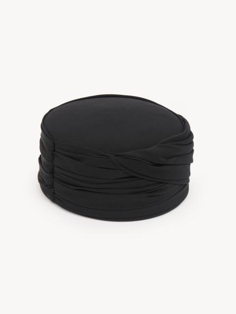 THE CHLOÉ TOQUE HAT IN SILK CRÊPE