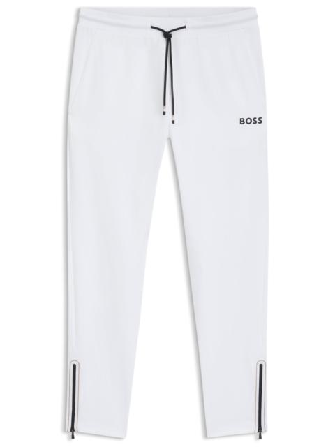 ACTIVE STRETCH-GABARDINE TRACKSUIT BOTTOMS WITH THERMOREGULATING TECHNOLOGY