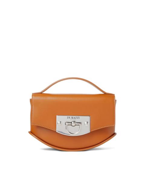 curved leather handbag