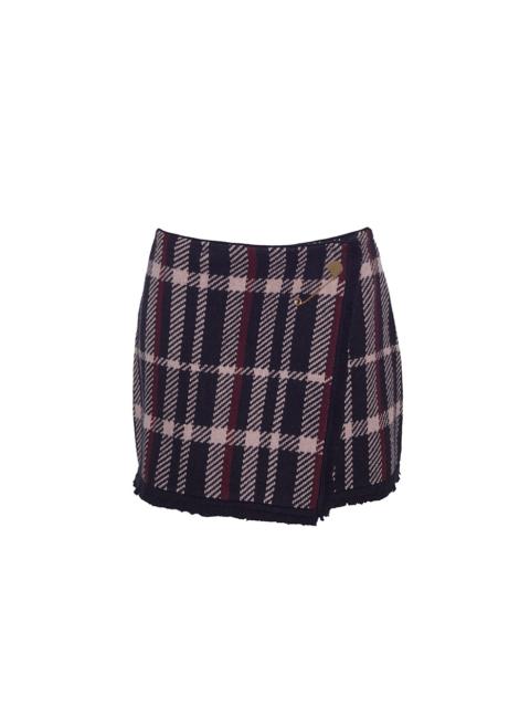 Jodi Mini Skirt
Fringed, Wrapped, and Pinned with Polish