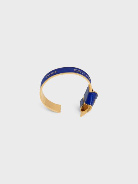 Celine Ribbon Knotted Cuff in Enamel and Brass with gold finish