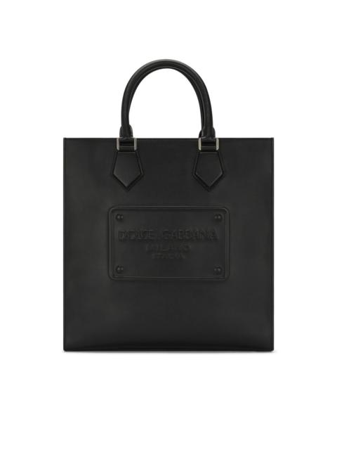 logo-embossed leather tote bag