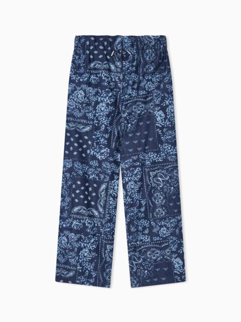 CHAMBRAY TROUSERS WITH ALL-OVER PRINT