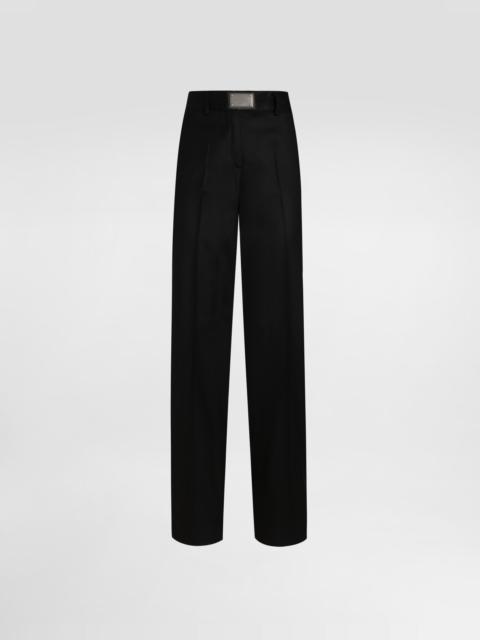 Flared flannel pants with logo tag