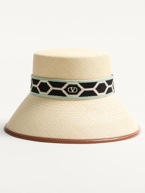 ANTIBES STRAW BUCKET HAT WITH LEATHER TRIM AND DIAMOND PATTERN RIBBON