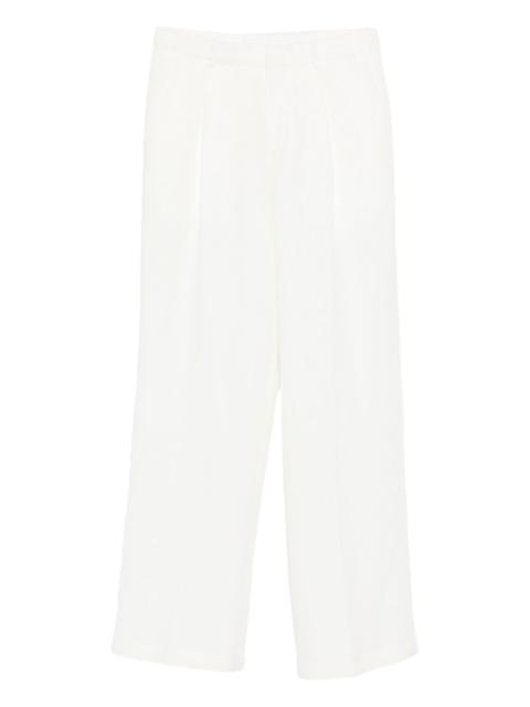 zip-fastening trousers