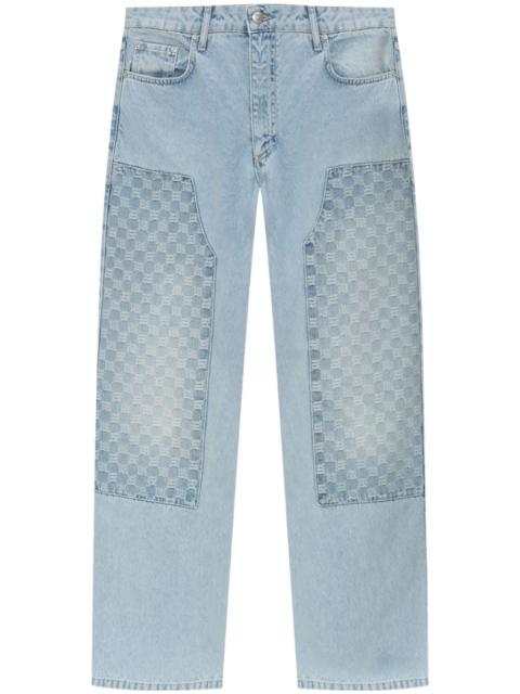 monogram-pattern jeans