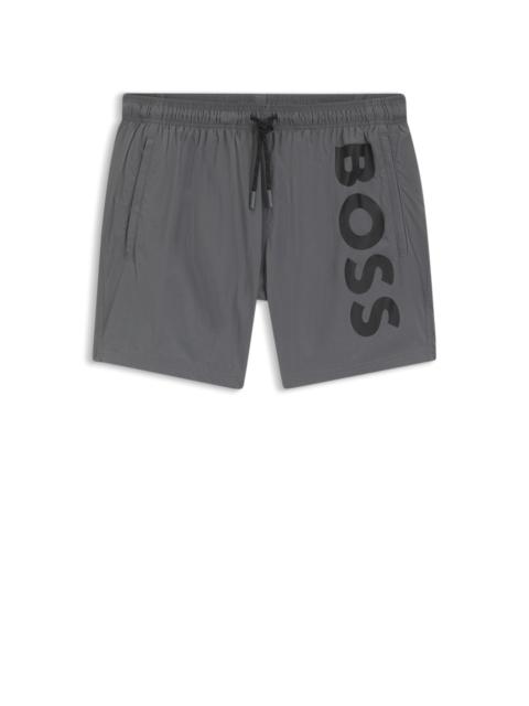 SWIM SHORTS WITH VERTICAL LOGO PRINT