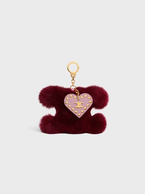 TRIOMPHE pom-pom Charm IN SHEARLING AND CALFSKIN
