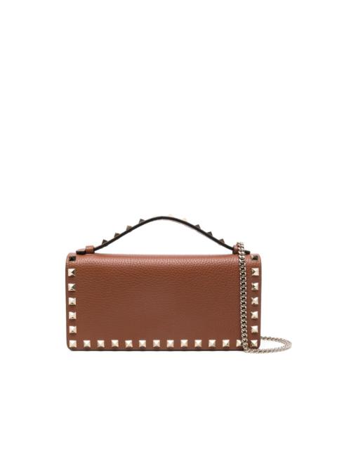 stud-embellished top-handle mini bag