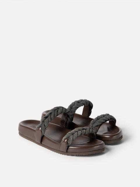 Leather sandals with precious braided straps