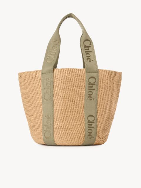 LARGE WOODY BASKET IN NATURAL FIBERS