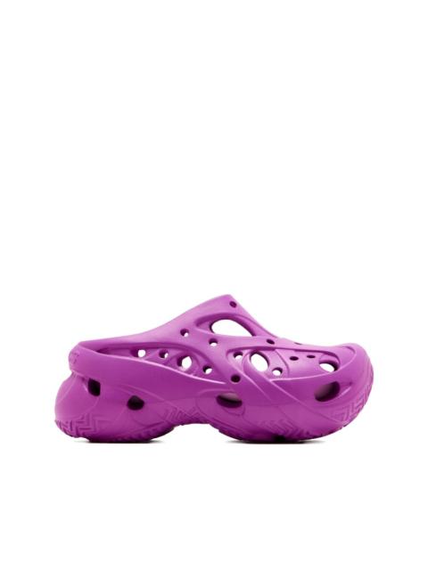 Caged perforated clogs