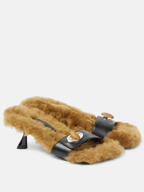 Turnlock shearling-trimmed mules