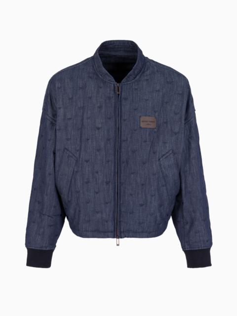 Denim jacket with all-over micro-eagle embroidery