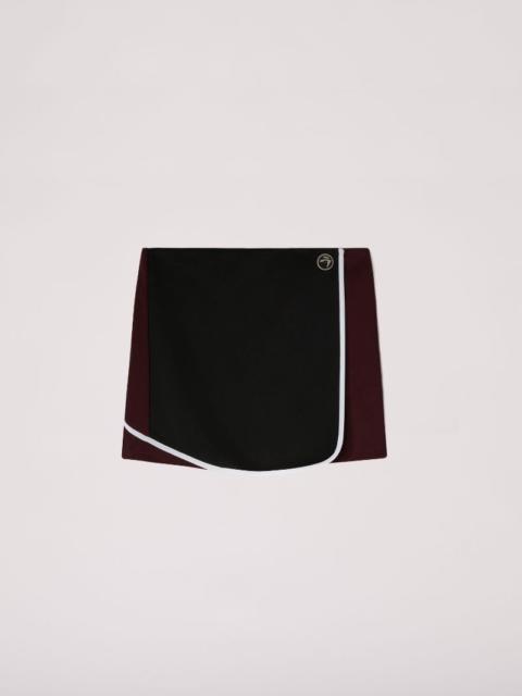 BACK PLEATS TRACK SKIRT