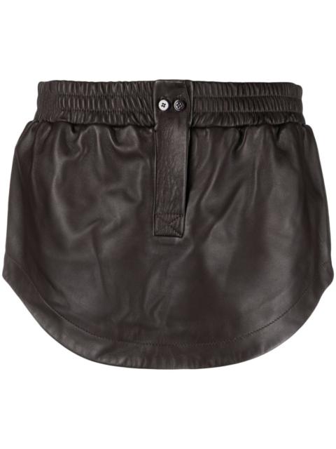 curved-hem leather miniskirt
