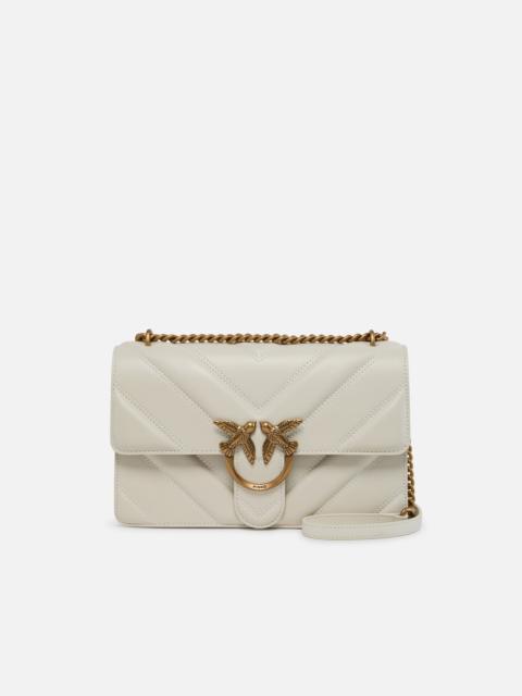 MEDIUM LOVE BAG PEBBLED LEATHER CROSSBODY BAG WITH V-SHAPED PATTERN AND LOGO