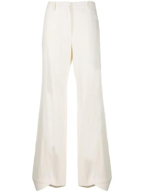 flared curved cuff trousers