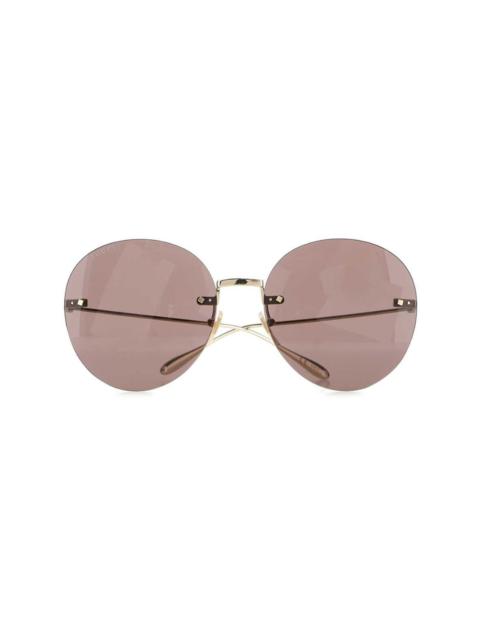 Gucci Tiger round-frame sunglasses with pendant