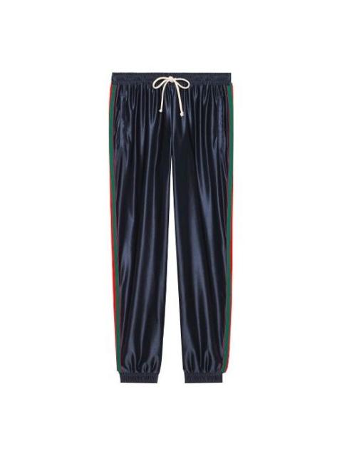 Shiny jersey pant with Web