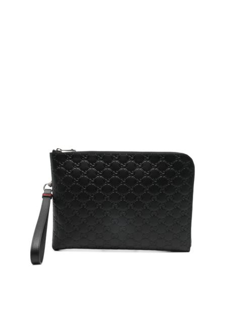 embossed clutch bag