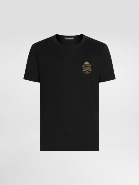 T-shirt with heraldic patch