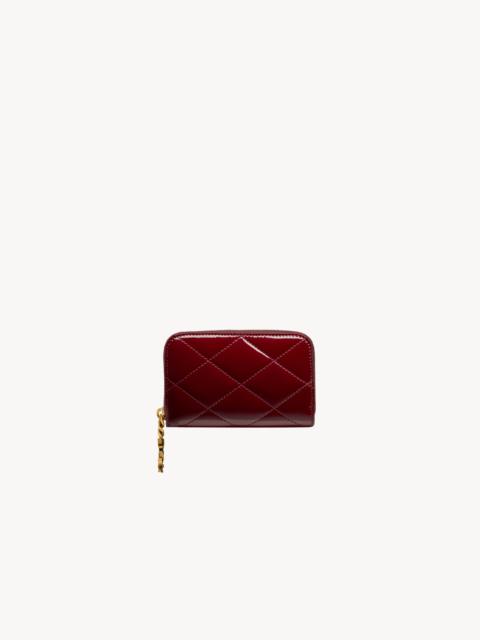 CASSANDRE BIJOU CHANGE PURSE IN PATENT LEATHER