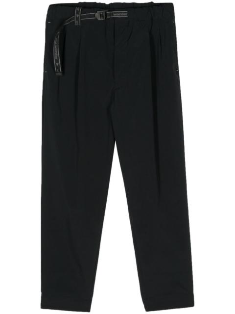 belted tapered-leg trousers