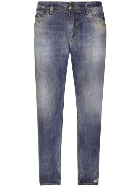 distressed-effect tapered jeans