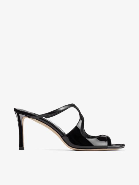 Anise 75
Black Patent Leather Mules