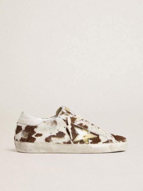 Women’s Super-Star in animal-print pony skin with gold metallic leather star