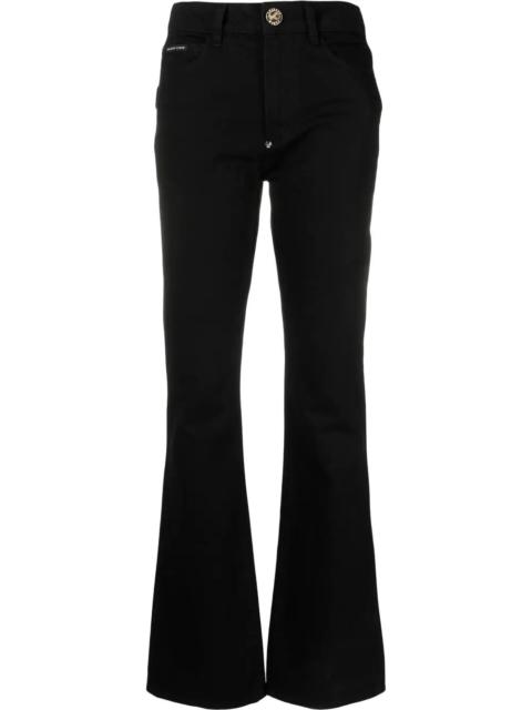 skull flared high-waisted jeans