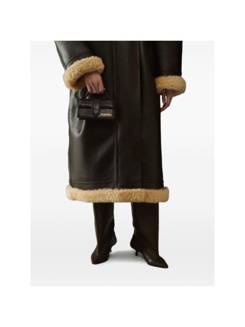 The Bambino top-handle leather clutch bag