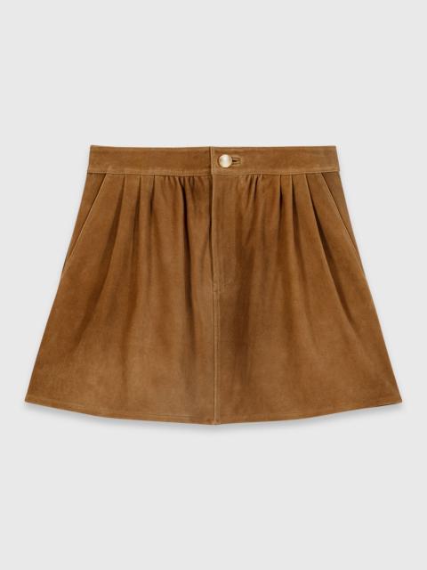 Short suede skirt
