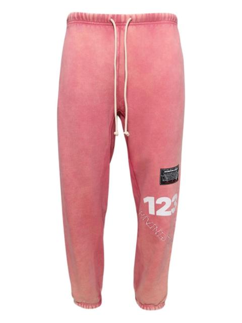 distressed track trousers