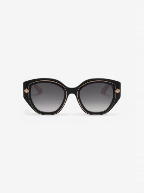 Wide and feminine front sunglasses with double ring decoration