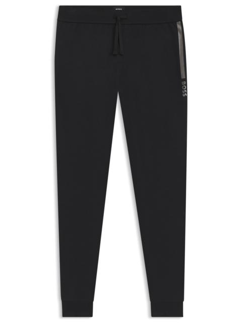 LOGO-PRINT TRACKSUIT BOTTOMS IN COTTON TERRY