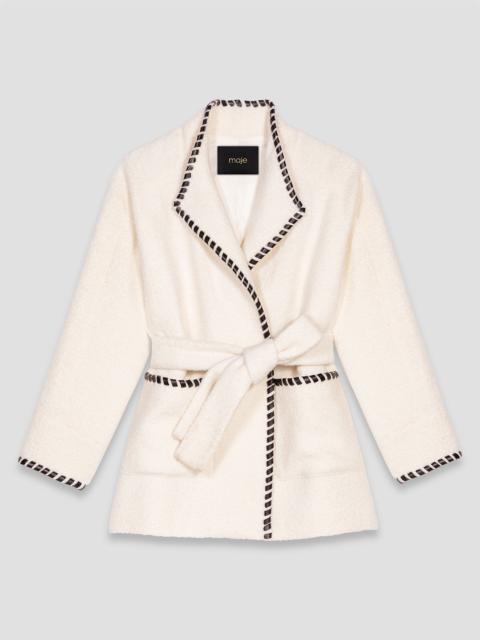 Lined coat with contrasting ribbon