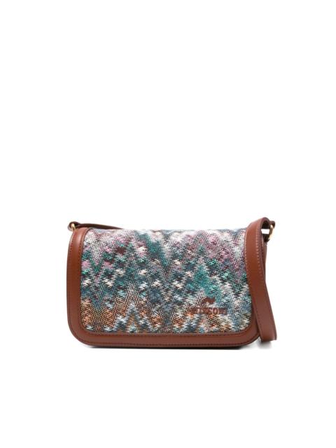 patterned leather cross body bag