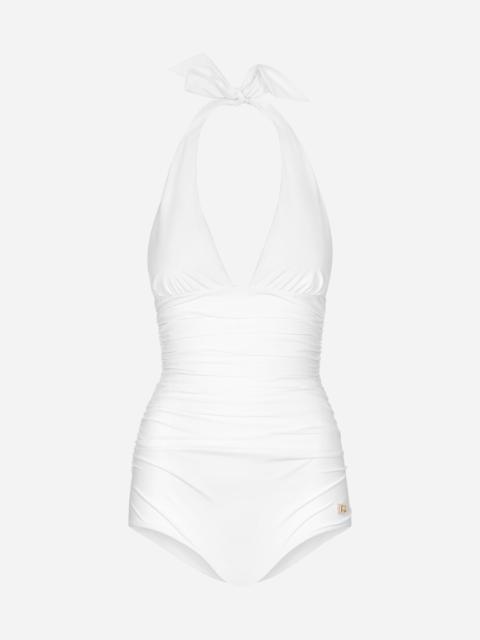 One-piece swimsuit with plunging neckline