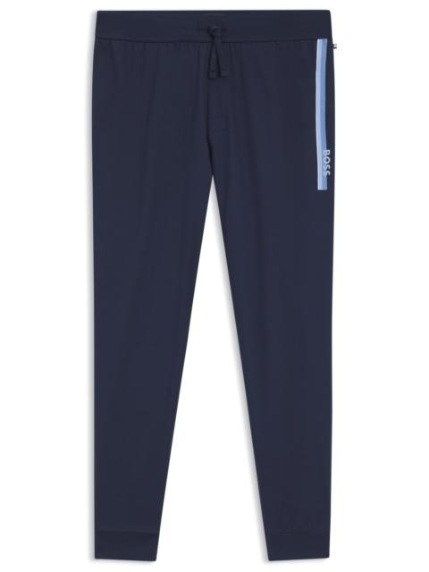 COTTON-TERRY TRACKSUIT BOTTOMS WITH LOGO AND STRIPES