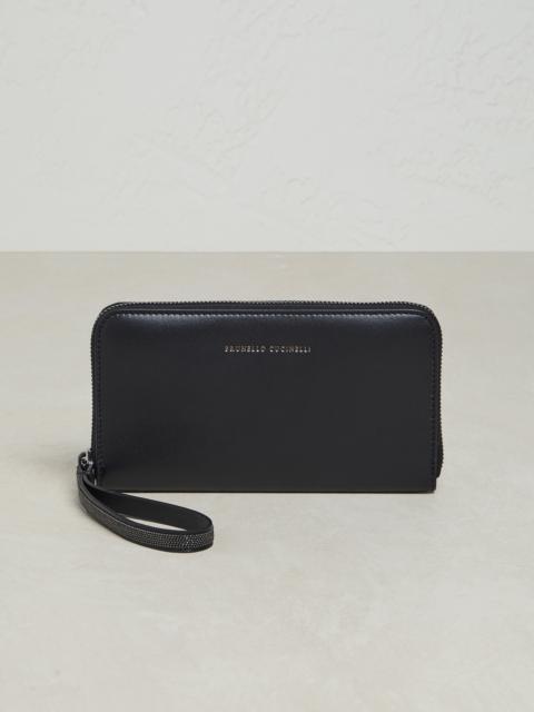 Matte calfskin wallet with precious zipper pull