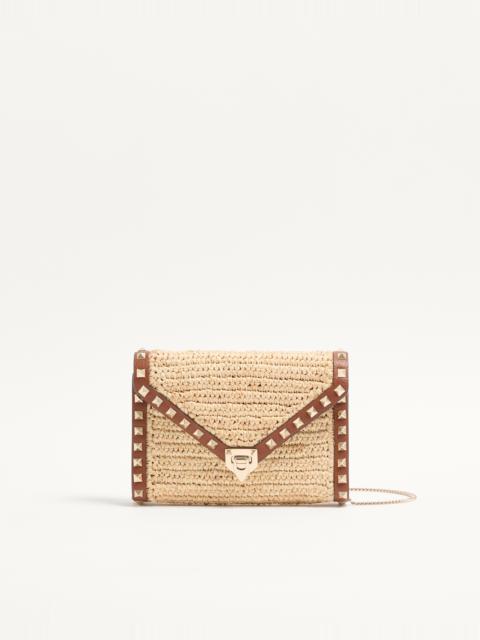 MINI ROCKSTUD RAFFIA SHOULDER BAG